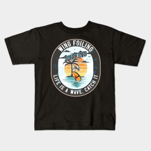 WING FOILING SURFING LIFE IS A WAVE CATCH IT Kids T-Shirt